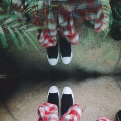Low section of people standing on steps