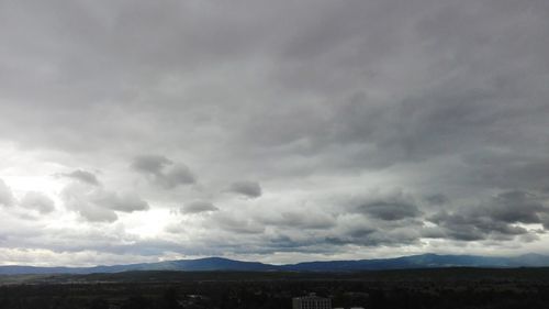 Storm clouds over landscape