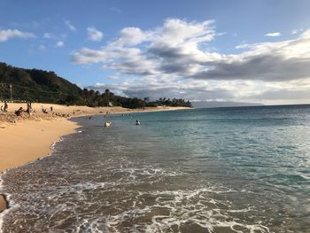 Scenic view of beach against sky