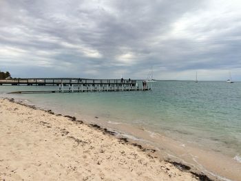 Scenic view of beach against sky