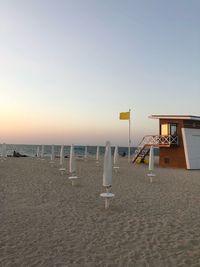 View of beach against sky during sunset