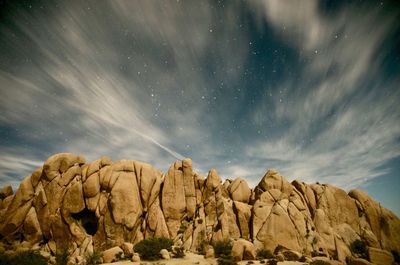 Scenic view of rock formation against sky