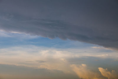 Low angle view of clouds in sky during sunset