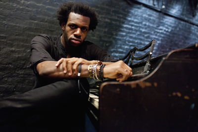 Portrait of young man sitting