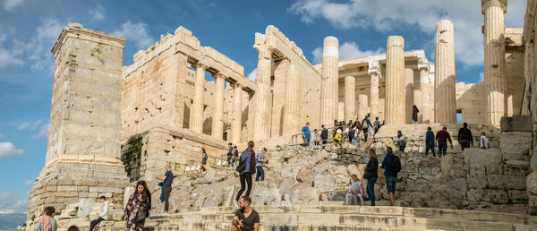 Group of people in front of historical building