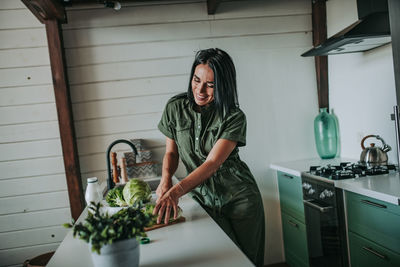 Woman standing at home