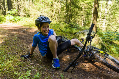 Boy falling off bike