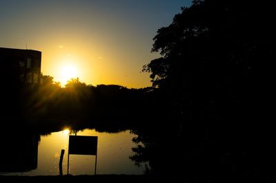 Scenic view of sunset over river