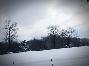 Scenic view of snow covered landscape