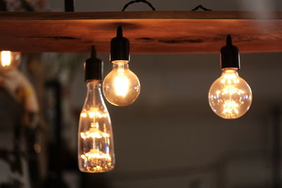 Close-up of illuminated light bulb