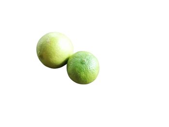 Close-up of oranges against white background