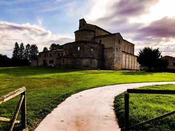 View of historic building against cloudy sky