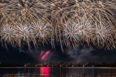 Firework display at night