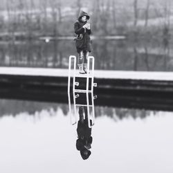 Reflection of woman in water