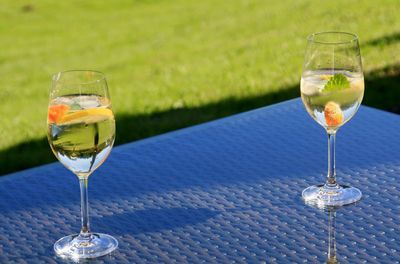 Close-up of drinks served on table