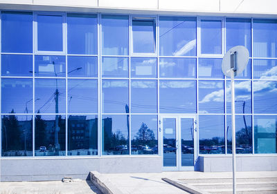 Reflection of building on glass window