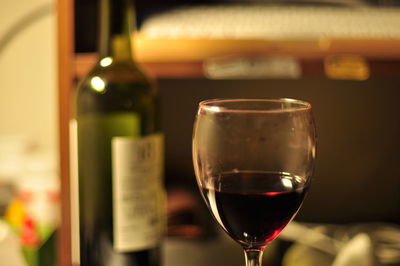 Close-up of wineglass on table