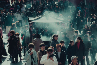Group of people standing in city
