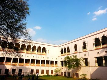 Low angle view of building against blue sky