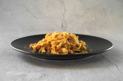 Close-up of food in plate on table