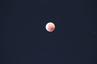 Low angle view of moon against sky