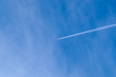 Low angle view of vapor trail in sky