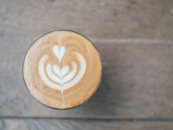 High angle view of cappuccino on table