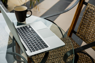 High angle view of coffee cup on table