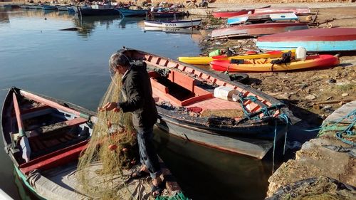 High angle view of abandoned boats moored at sea