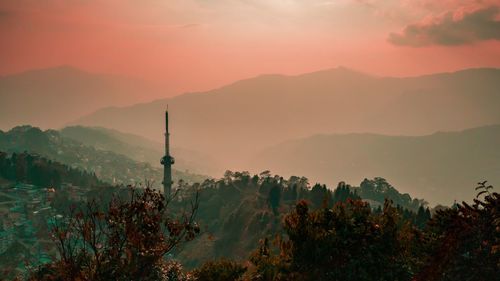 Scenic view of mountains against sky during sunset