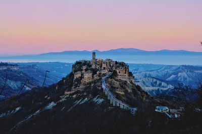 Scenic view of mountains against sky during sunset