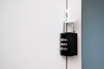 Close-up of combination lock on door