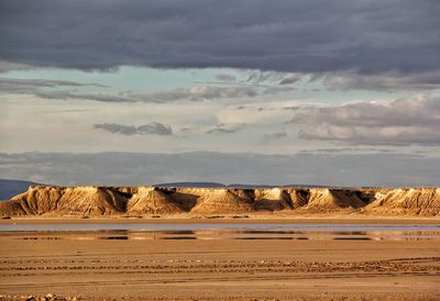 Scenic view of desert against sky