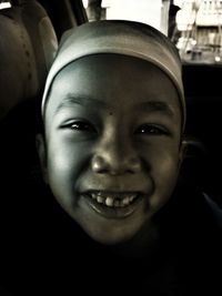 Close-up portrait of smiling boy