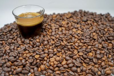 Close-up of coffee beans on table