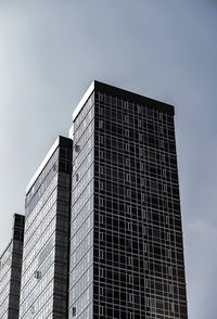 Low angle view of modern building against clear sky