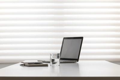 Close-up of laptop on table