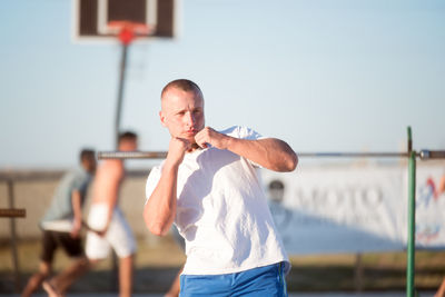 Man exercising at park