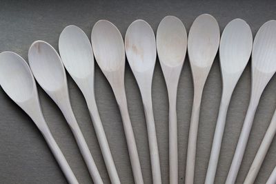 Close-up of wooden spoons on table