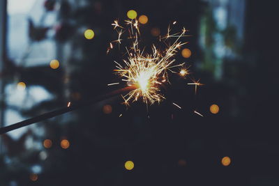 Close-up of firework display at night