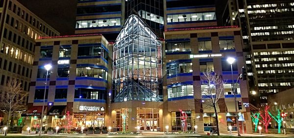 Low angle view of illuminated buildings at night