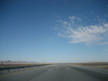 Road against blue sky