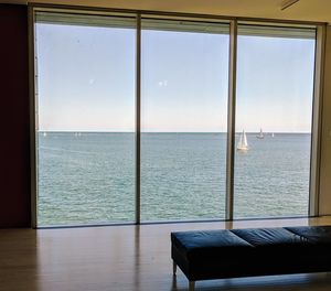 Scenic view of sea seen through window