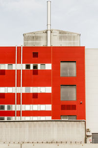 Red building against sky