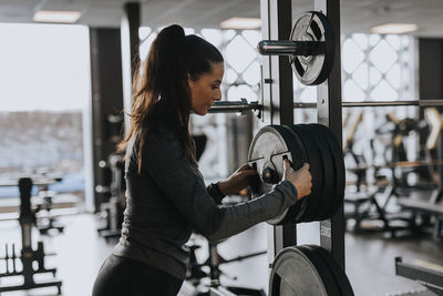 Woman exercising in gym