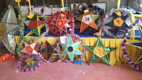 High angle view of multi colored umbrellas on tiled floor