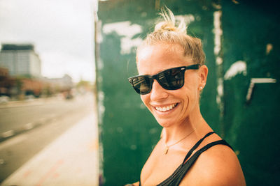 Portrait of smiling man wearing sunglasses