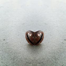 Close-up of heart shape on bread