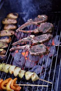 High angle view of meat on barbecue grill