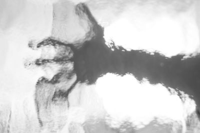 Close-up of waterfall against sky